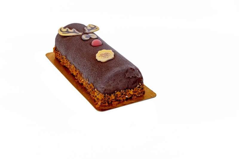 Vanille- en speculaasroomijs, een laagje speculaaskoek & versierd met chocolade ganache
